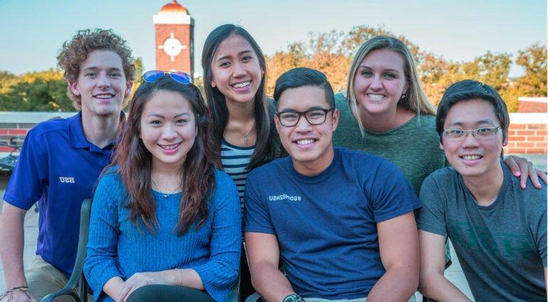 A group of international HSU students pose for the camera.